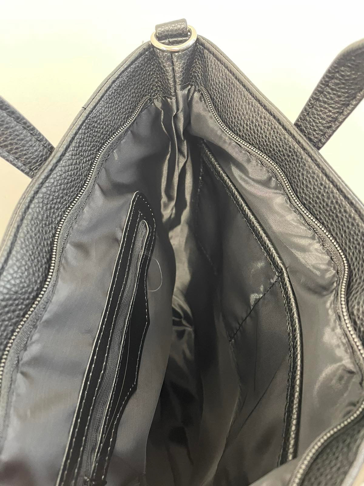 Sominta moteriška kuprinė