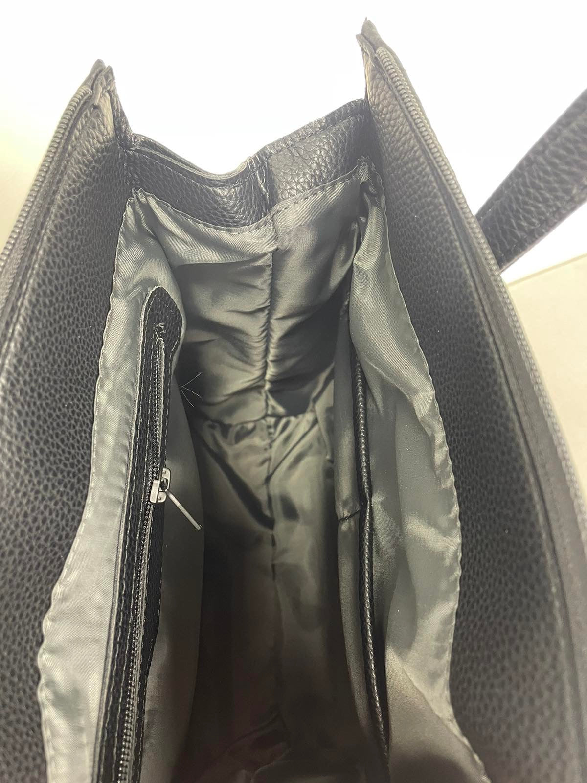 Sominta moteriška kuprinė-rankinė