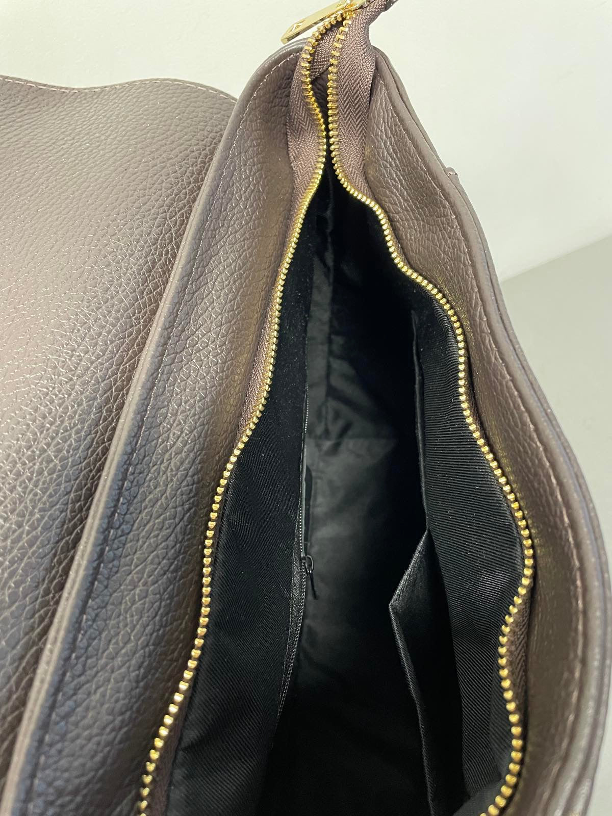 Ruda natūralios odos moteriška kuprinė