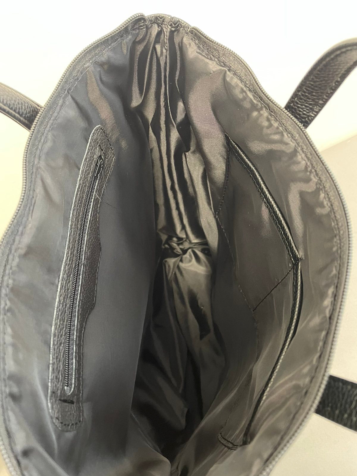 Sominta moteriška kuprinė