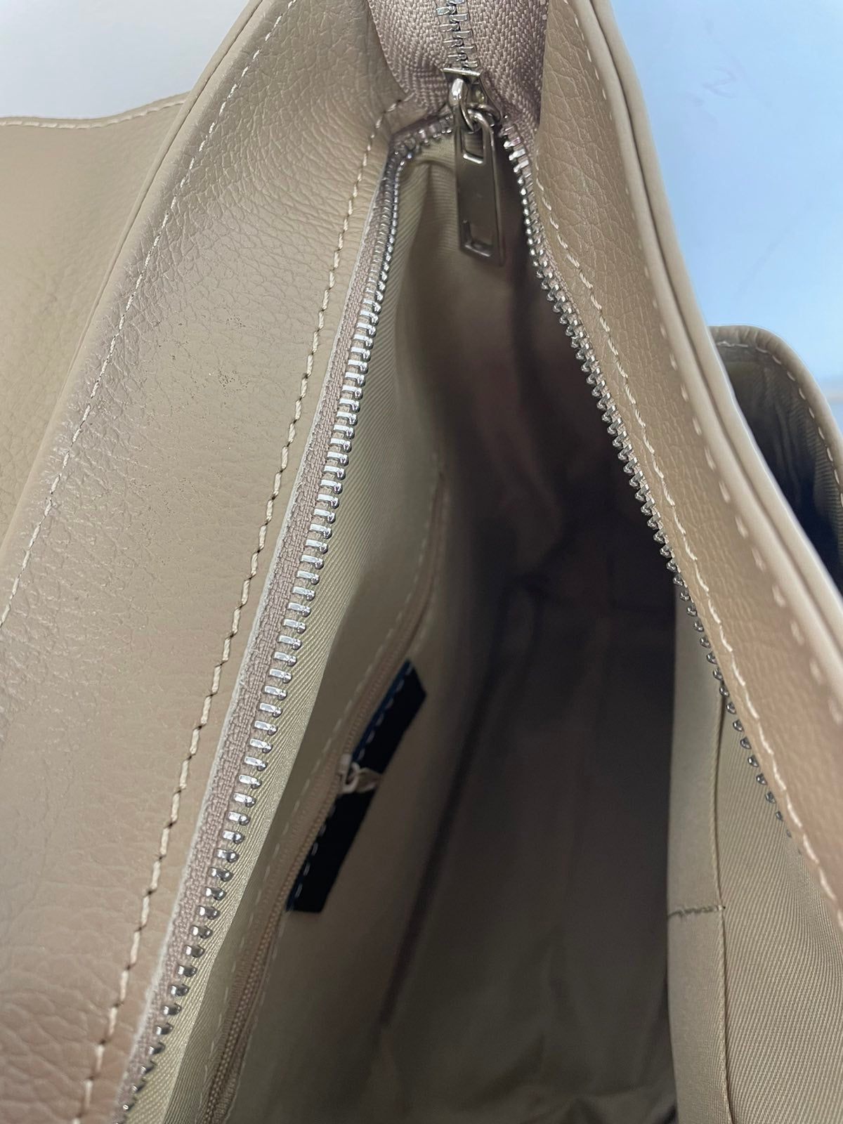 Natūralios odos moteriška kuprinė