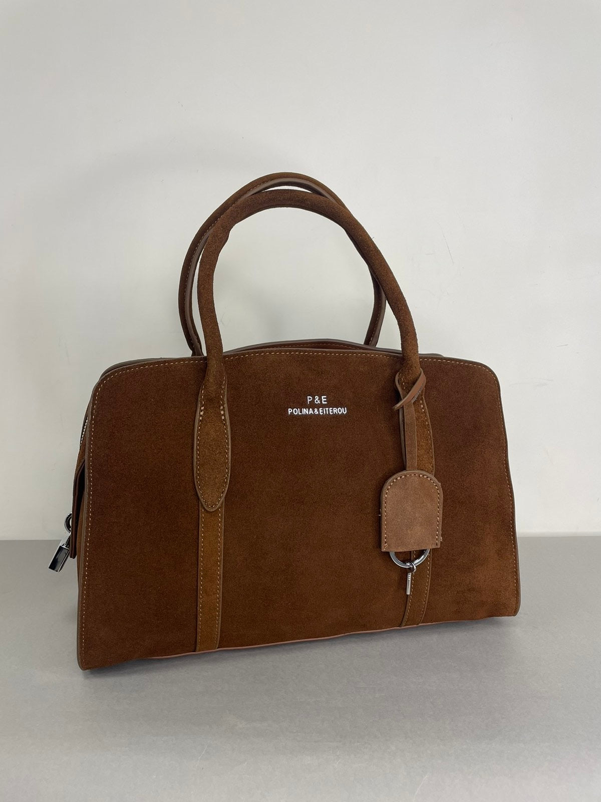 Ruda natūralios odos moteriška rankinė