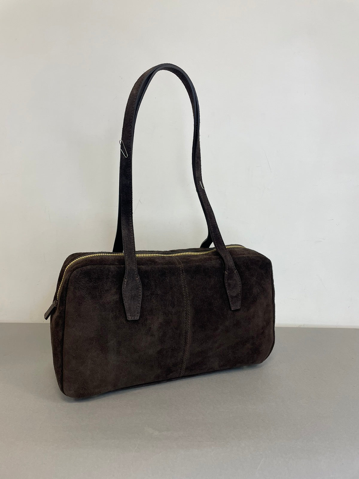 Ruda natūralaus zomšo rankinė