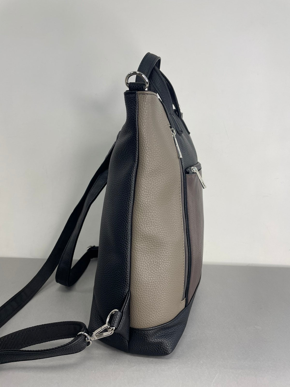 Sominta moteriška kuprinė