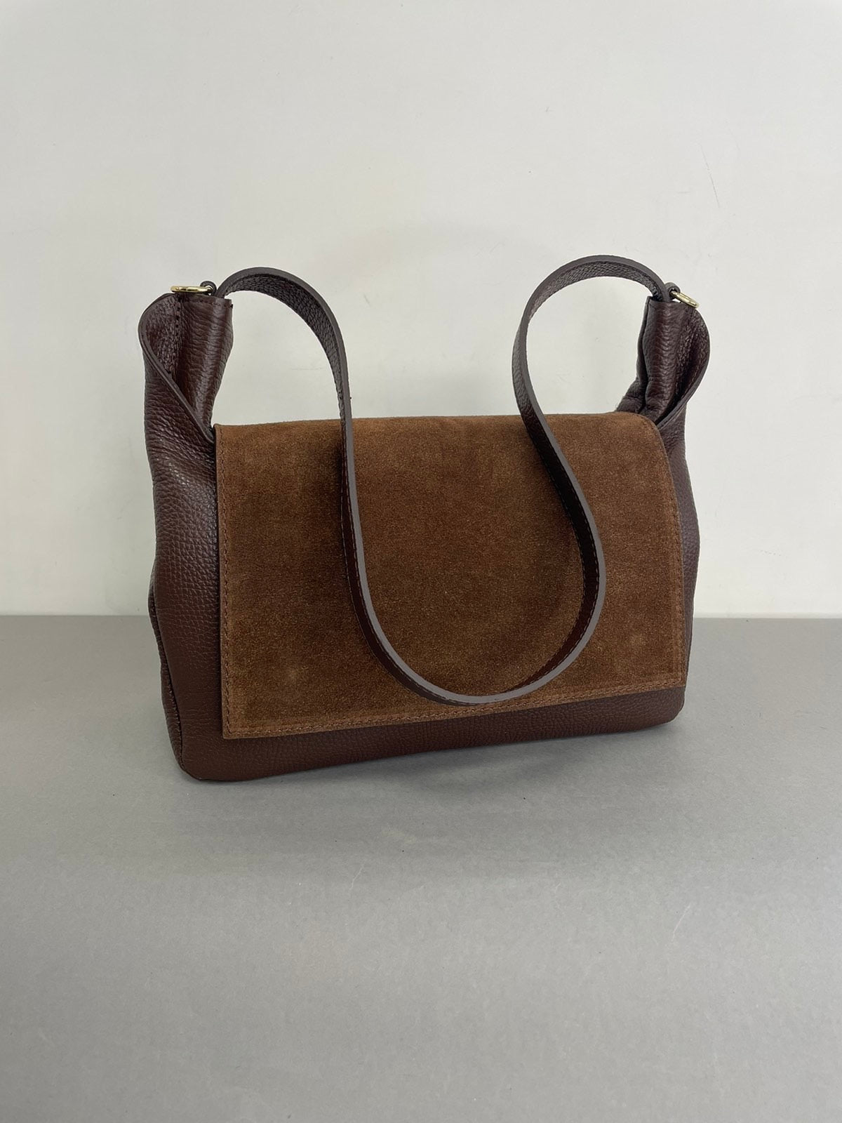 Ruda natūralios odos moteriška rankinė