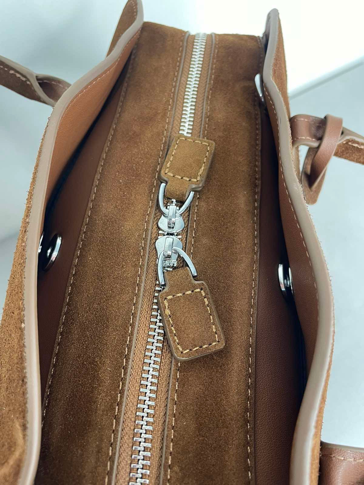 Ruda natūralios odos moteriška rankinė