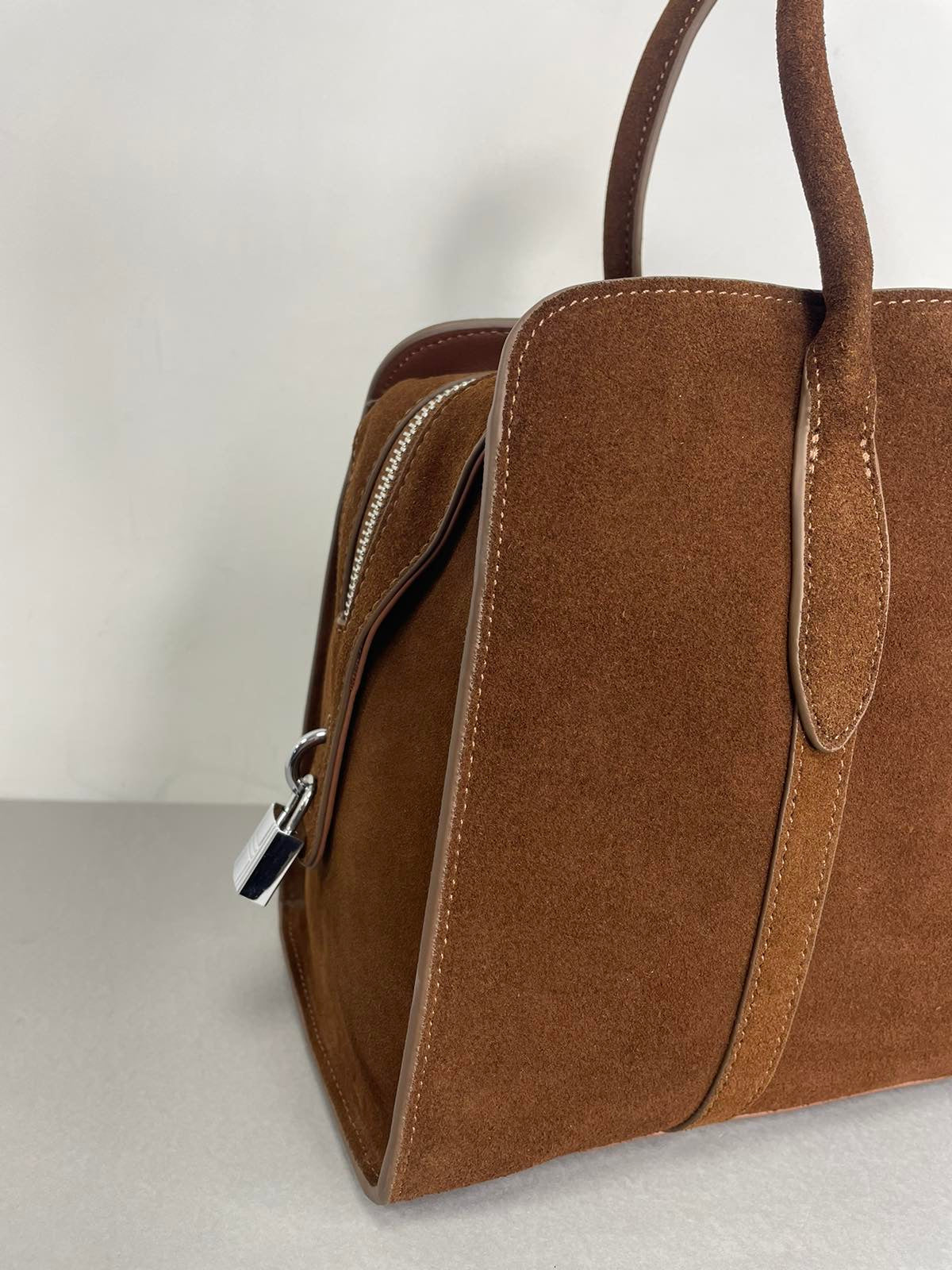 Ruda natūralios odos moteriška rankinė