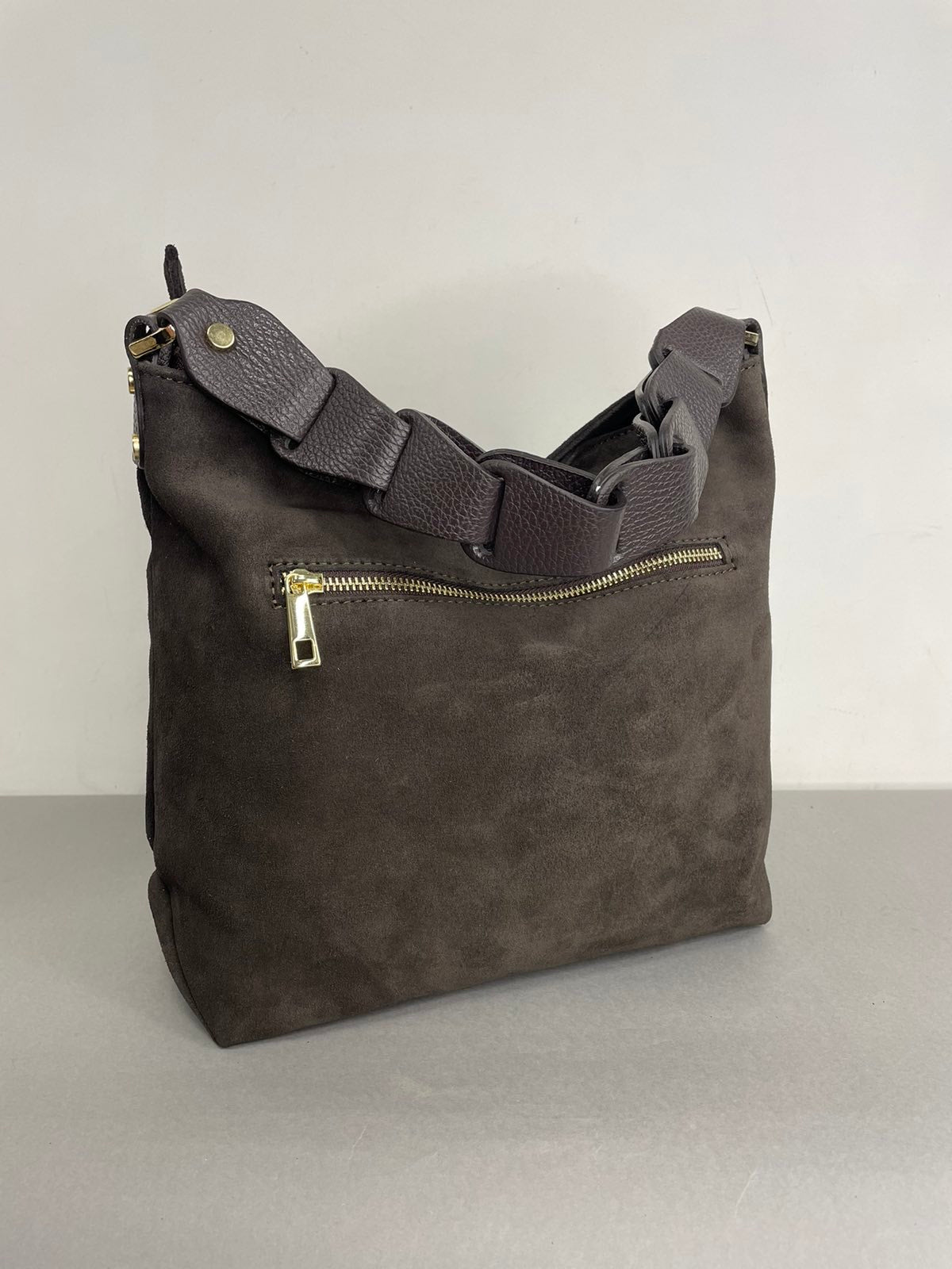 Ruda verstos odos moteriška rankinė