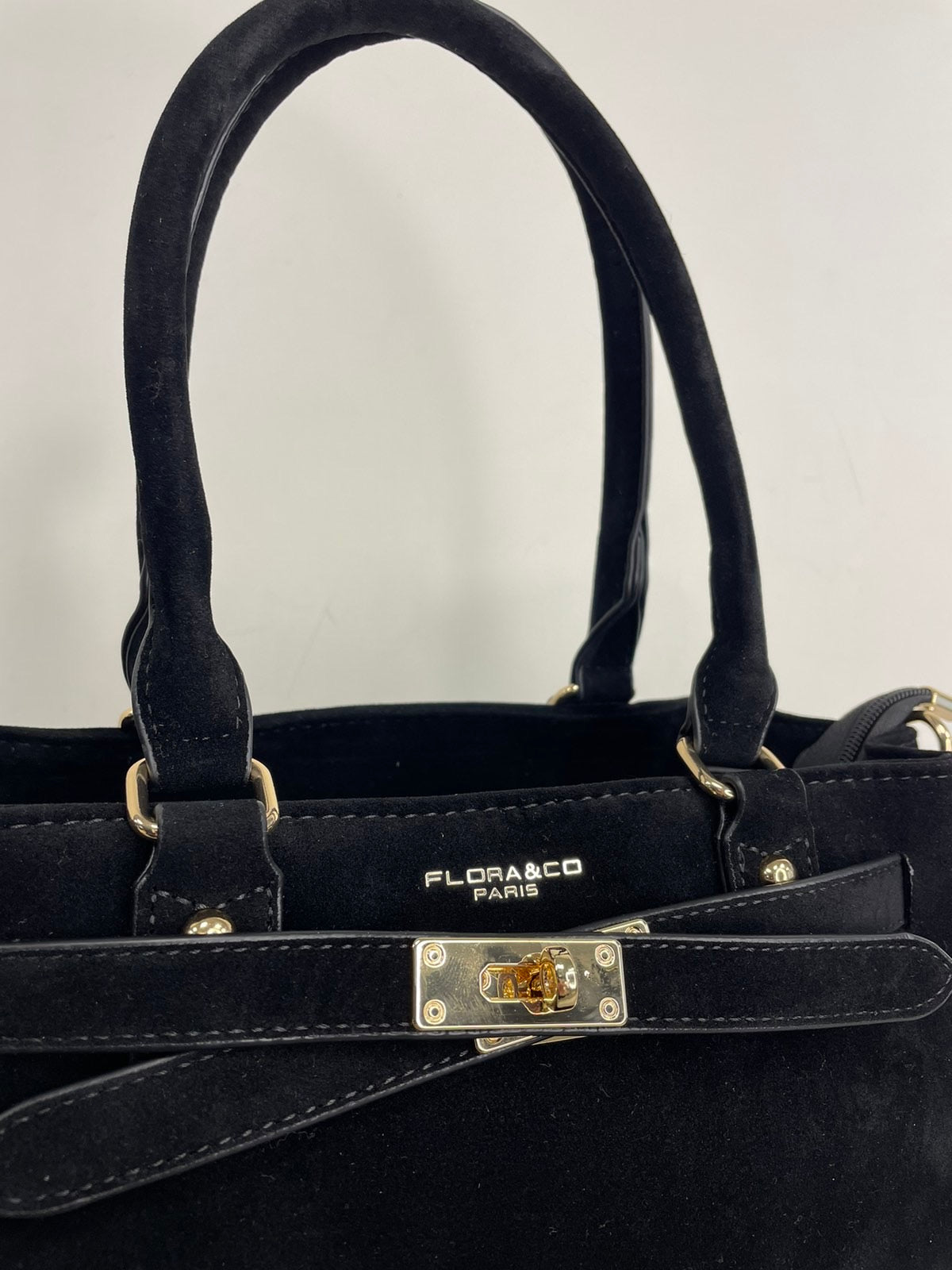 Juoda moteriška rankinė