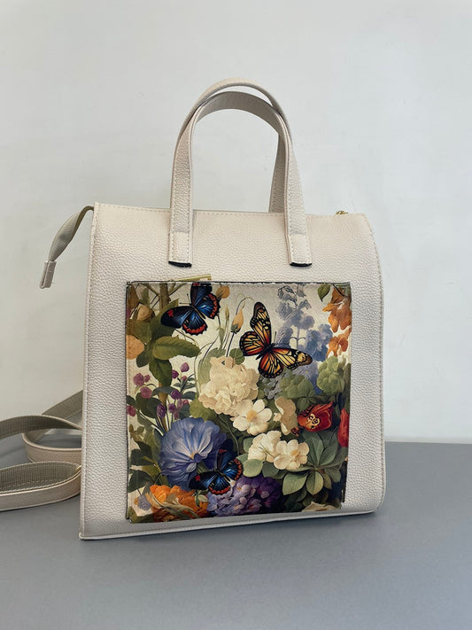 Sominta moteriška kuprinė-rankinė