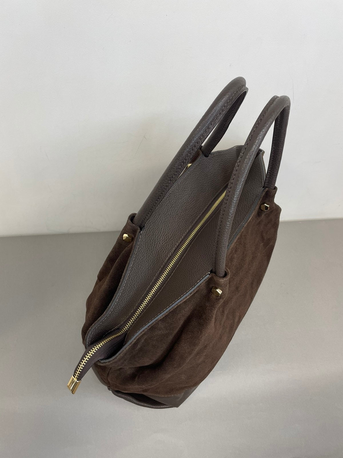 Ruda natūralios odos moteriška rankinė