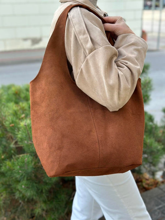 Moteriška verstos odos rankinė