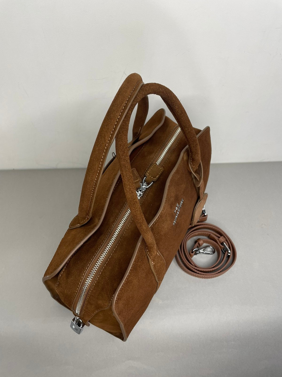 Ruda natūralios odos moteriška rankinė