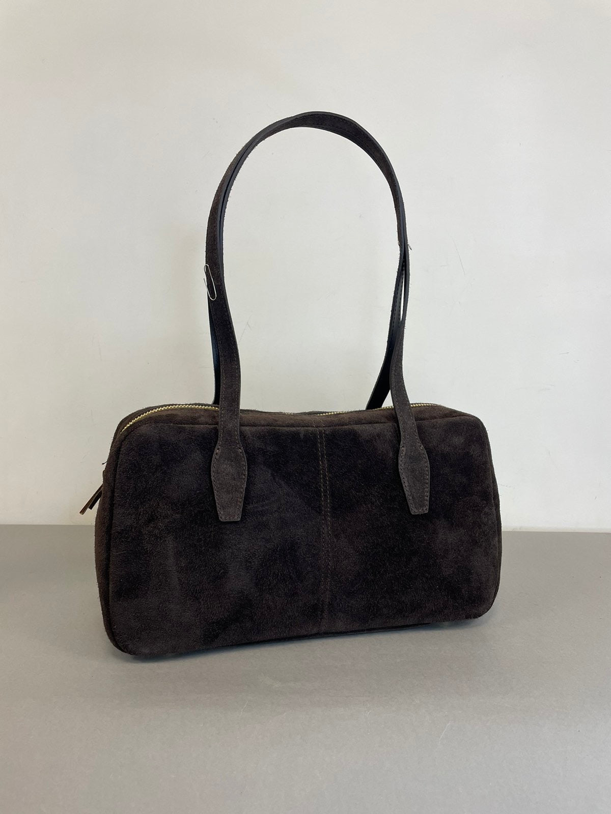 Ruda natūralaus zomšo rankinė