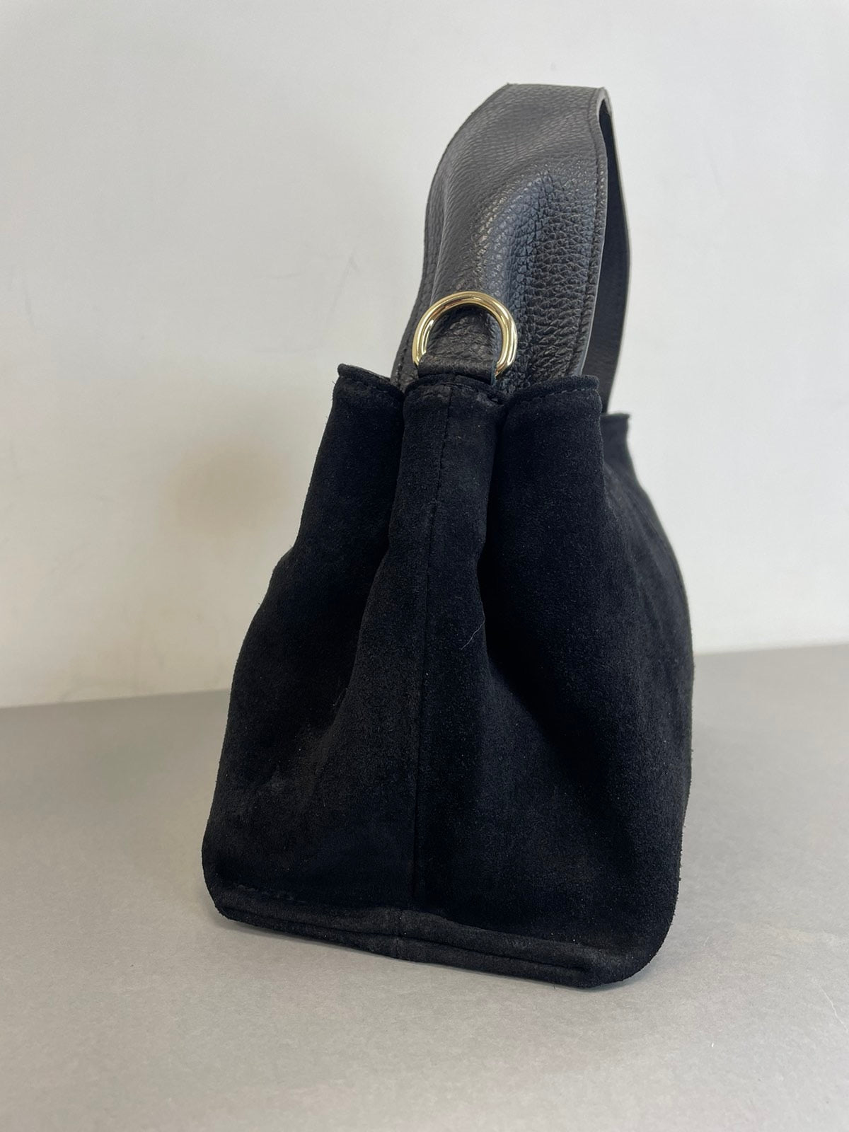 Stilinga moteriška odinė rankinė