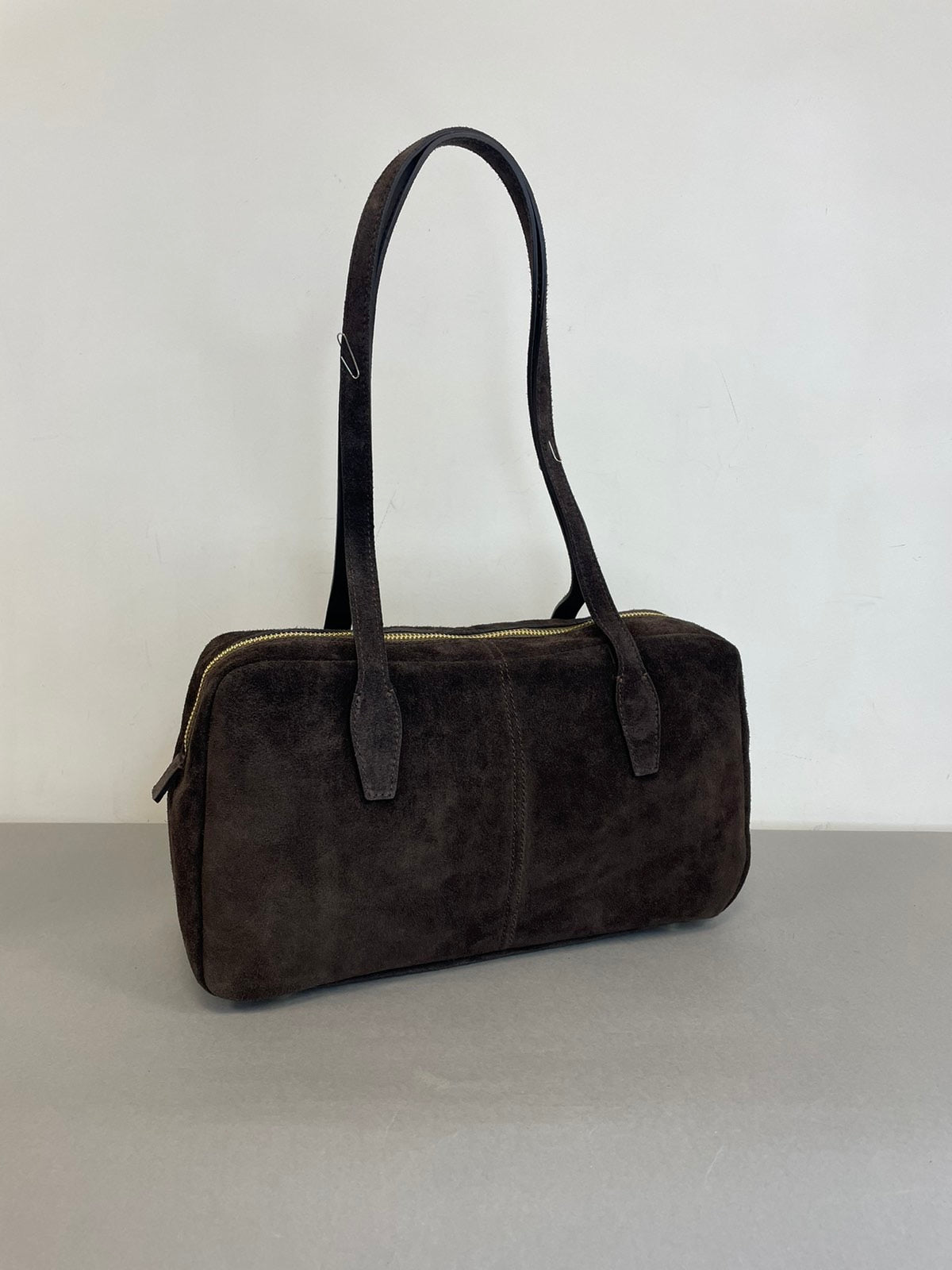 Ruda natūralaus zomšo rankinė